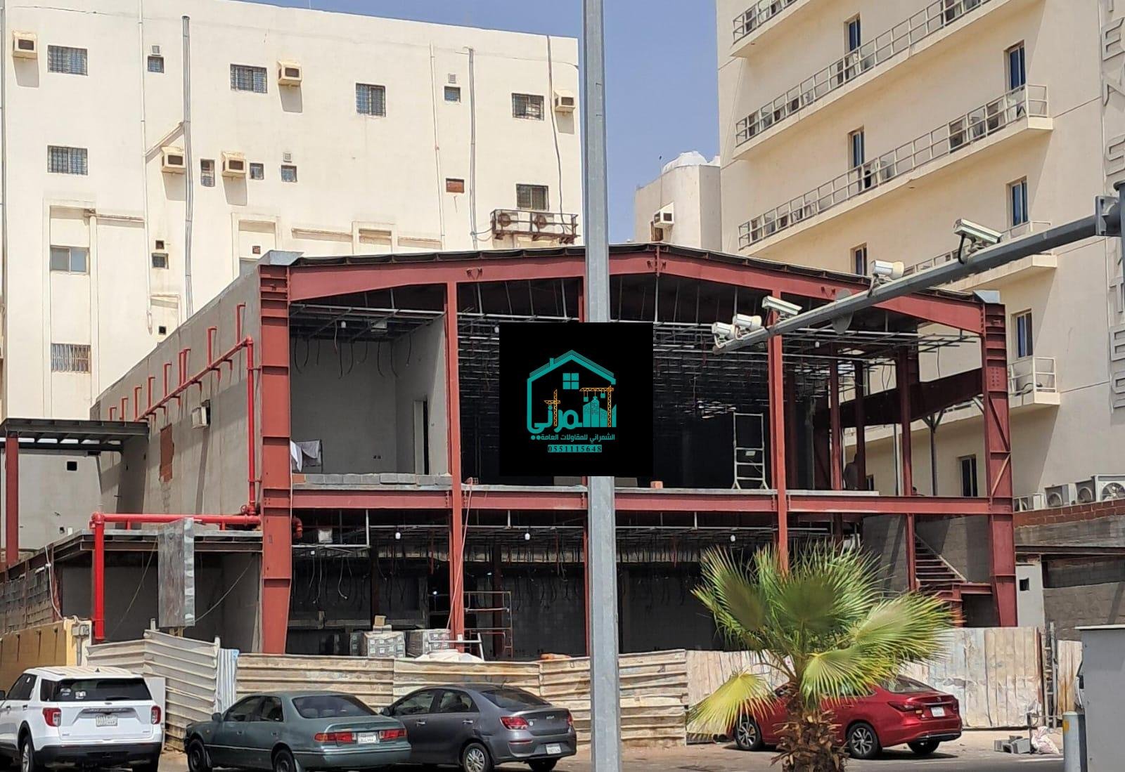 هنجر حديدي واسع البحر بهيكل جملوني وتغطية ساندوتش بانل